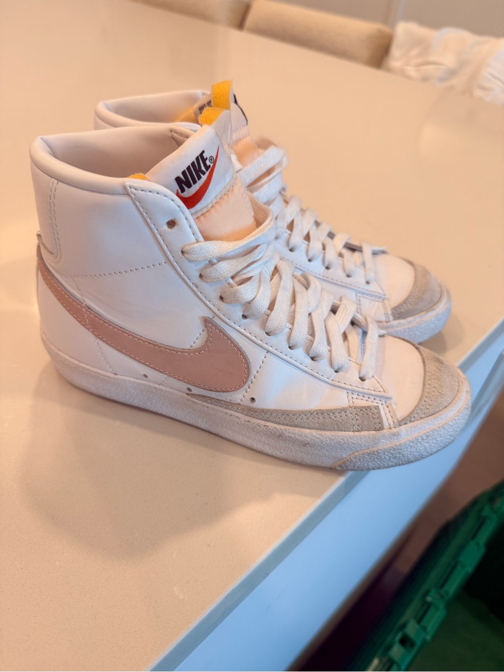 Nike Women's High-Top Sneakers in White with Blush Swoosh